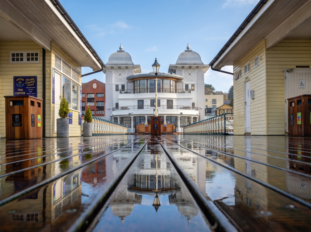 Penarth Pier Pavilion after rain, reflected in the wet boards